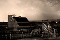 red_barn_farm_lightning_thunderstorm_bw-sepia