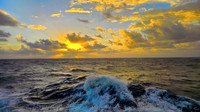 Ocean Sunset Captivating Waves & Golden Sky Bliss