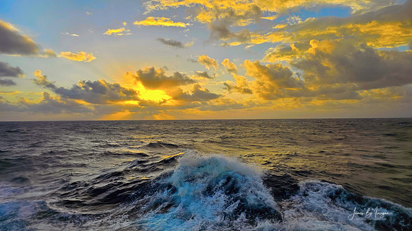 Ocean Sunset Captivating Waves & Golden Sky Bliss