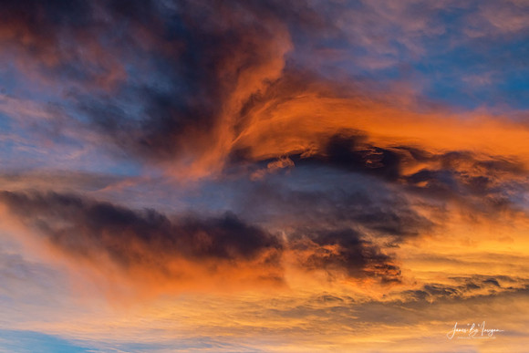 Faces In The Sunset Clouds