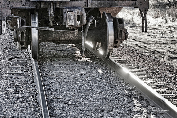 Railroad_Train_Car_Wheels_Hitting_Tracks