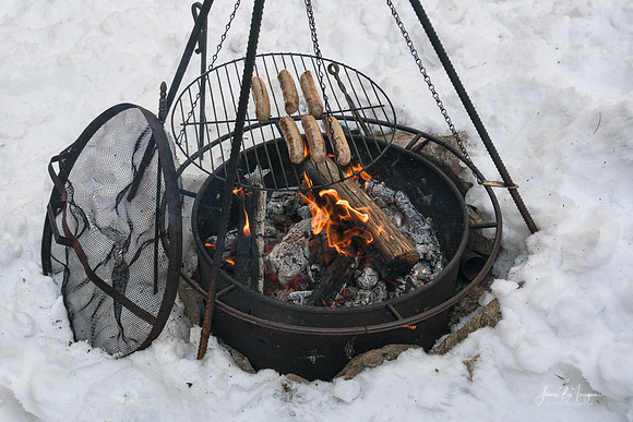 Cowboy Cooking Brats In The Snow