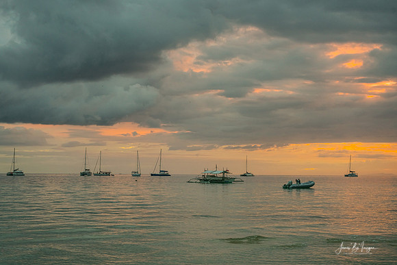 Sails Silhouetted in Sunset's Glow Camotes Twilight